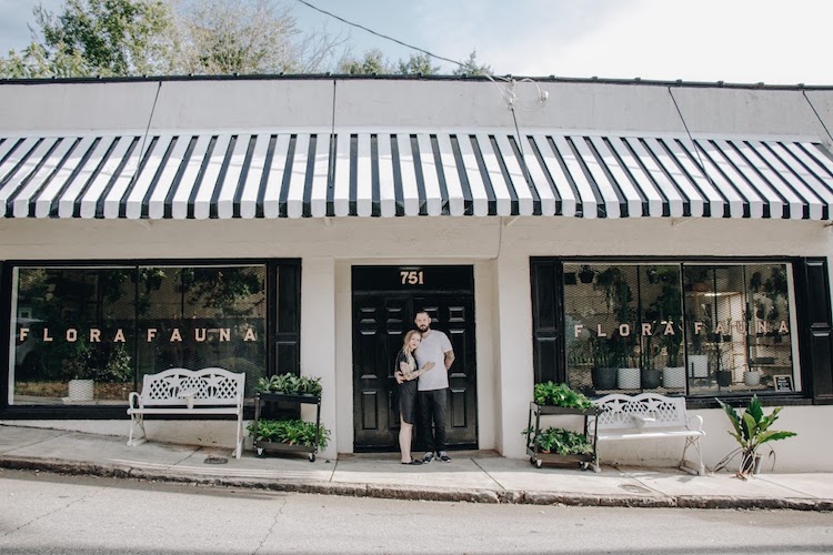A streetview image of the Flora Fauna storefront, with owners Katelynn Corley & Rex Holloway standing in the doorway.