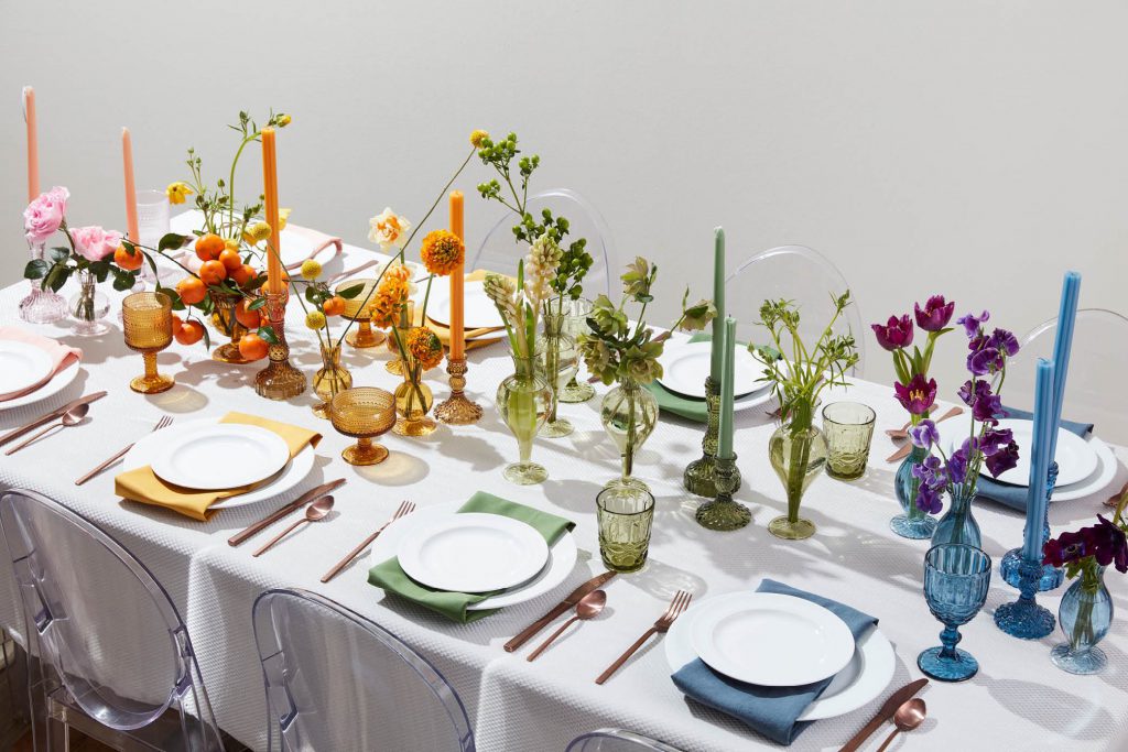 A vibrant assortment of colorful flowers arranged on a table.