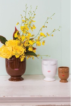 Celfie Collection styled and paired with a cheerful yellow floral arrangement.