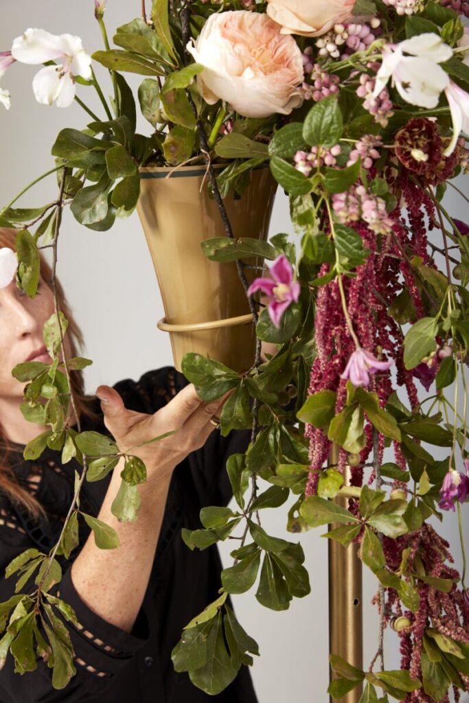 Image of Sue McLeary, Passionflower Sue, designing into arch decor wedding.