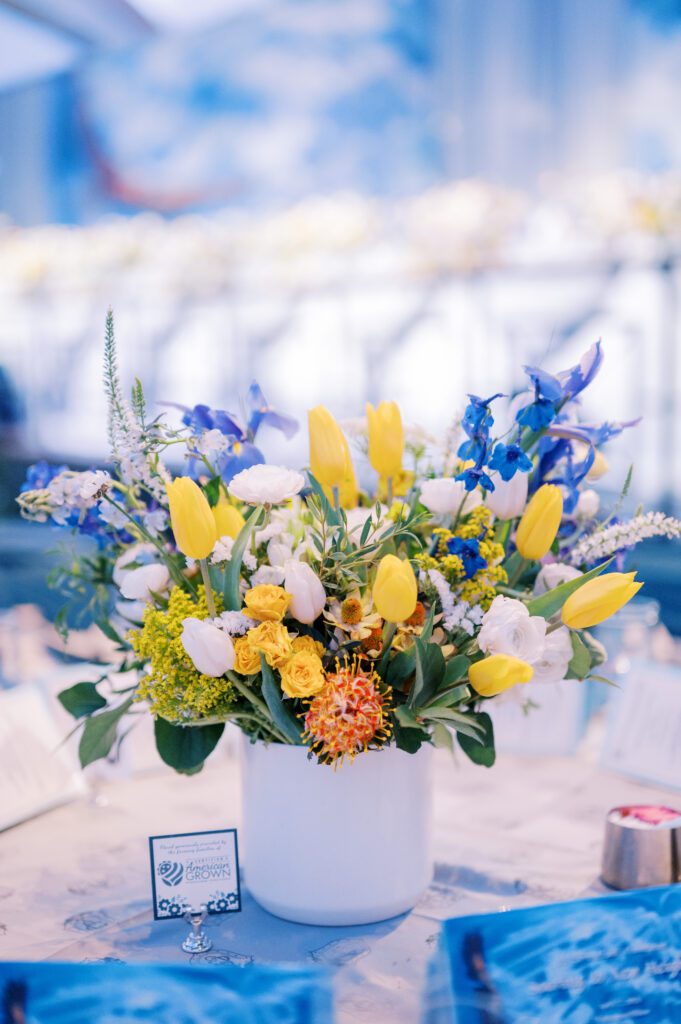 Image of floral centerpiece in wholesale floral decor from Accent Decor, displayed at 111th annual First Lady’s Luncheon.