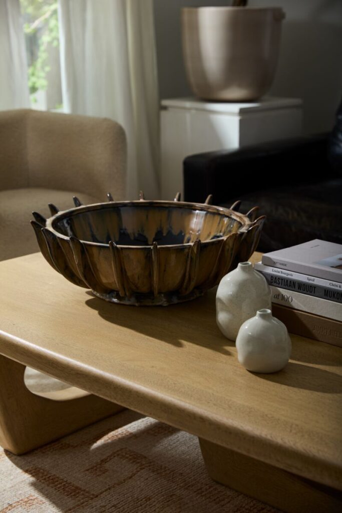 Image of the Iliad Bowl, a wholesale home accent from the wholesale decor supplier Accent Decor, displayed atop a table.