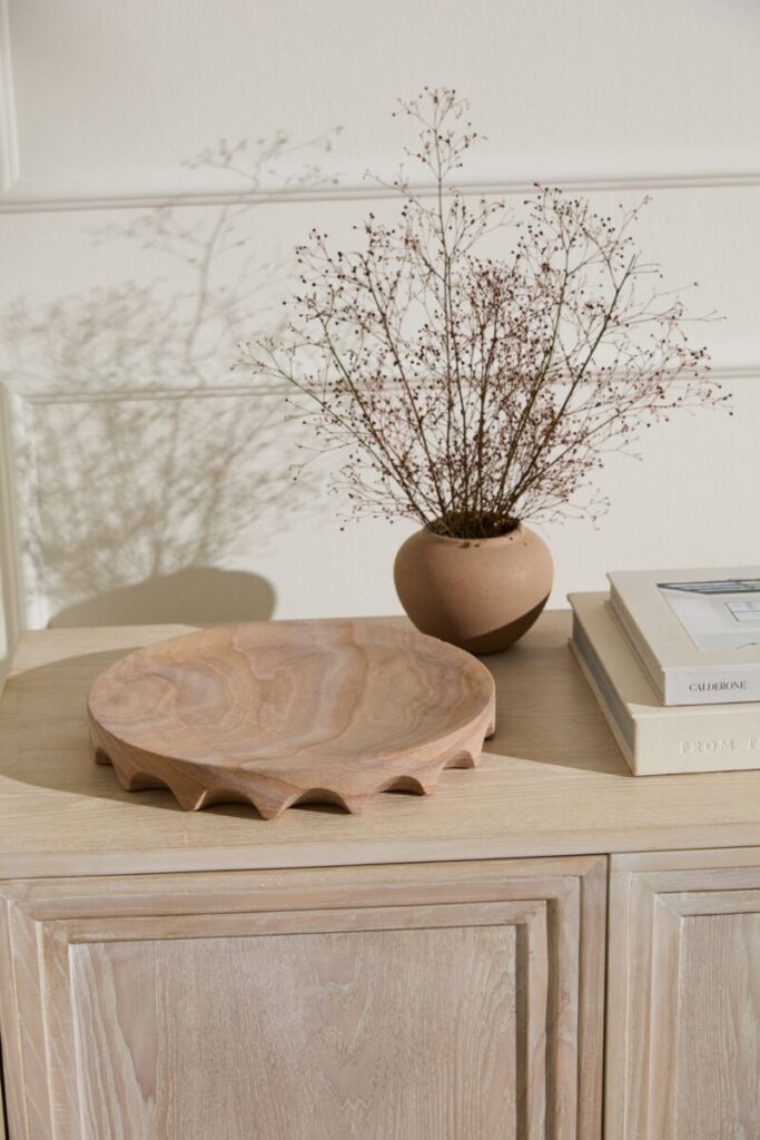 Image of the Coliseum Tray, a wholesale home accent from the wholesale decor supplier Accent Decor, displayed atop a table.