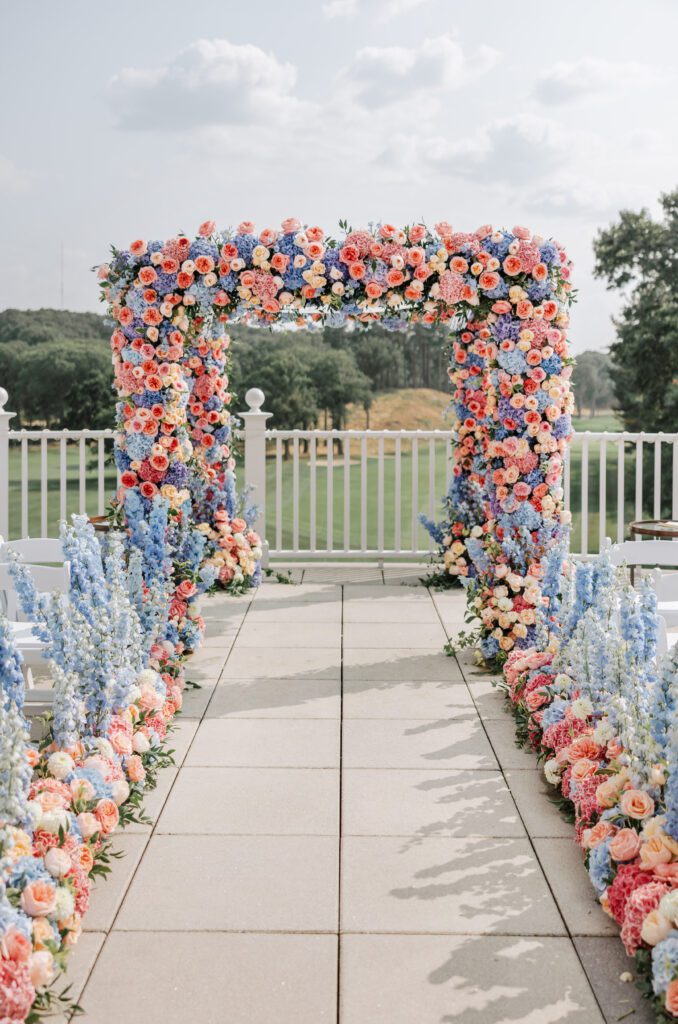 An image of a large scale arch decor wedding ceremony decor.