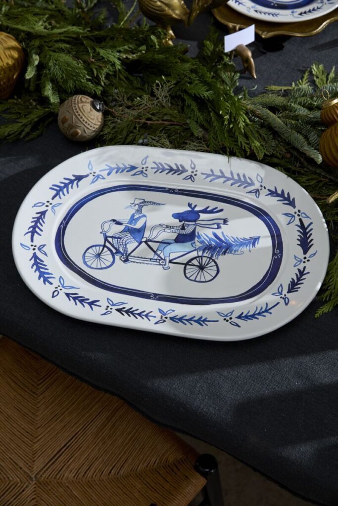 An E+E Dinner Plate set atop a dining table.