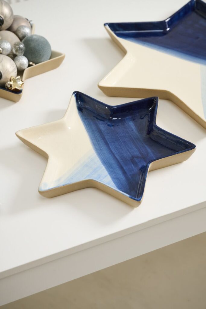 Accent Decor's Magen Platter atop a white table. 