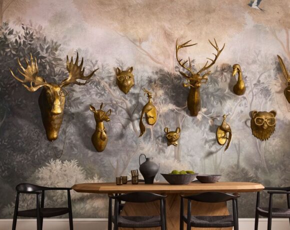 Styled out wall of Eric + Eloise Wall Mounts directly above a styled dining table.