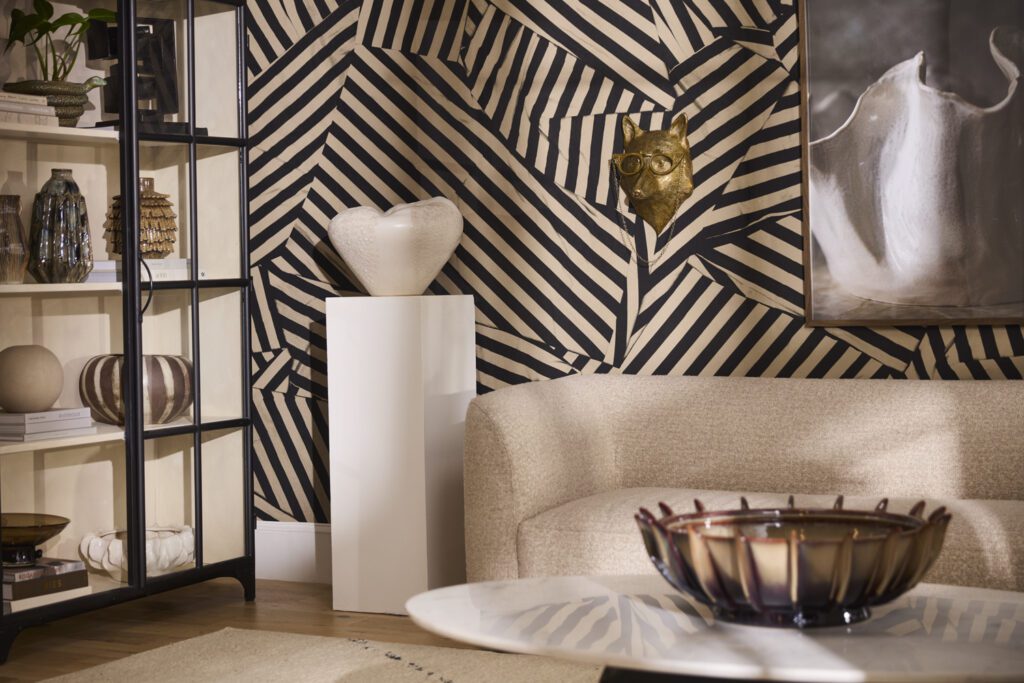 Stylish living room with an Eric + Eloise Wall Mount directly above a sofa.